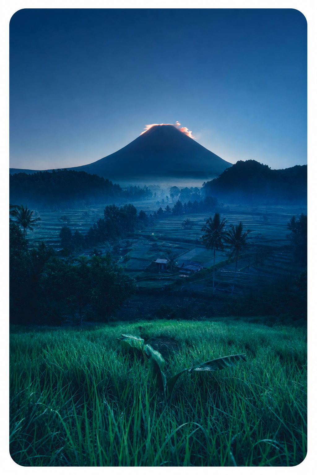 Indonesia volcano and valley at blue hour